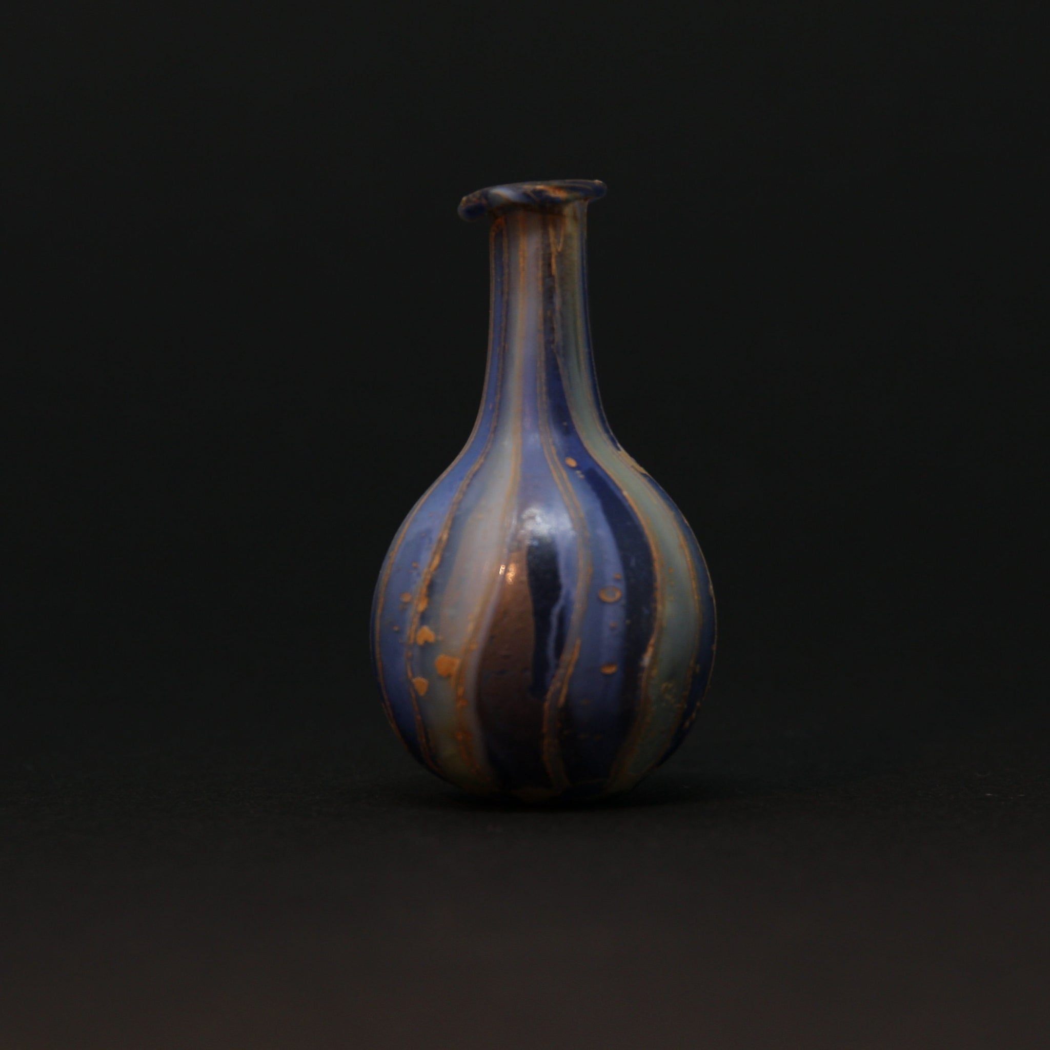 A Roman Blue Marbled Glass Vessel | 2nd-3rd century AD