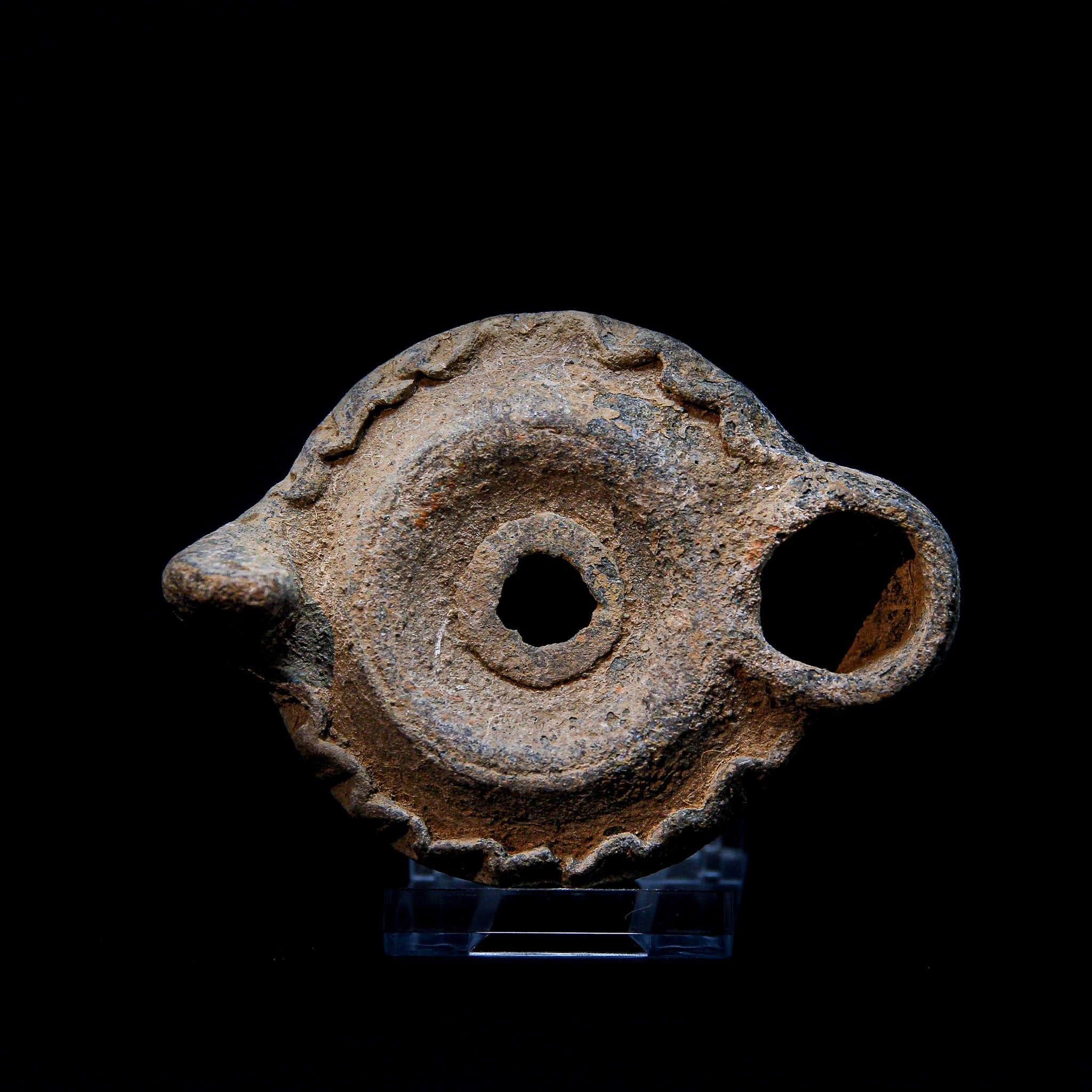 A Roman Greyware Oil Lamp with Pie-crust border | Circa 1st-3rd Century AD