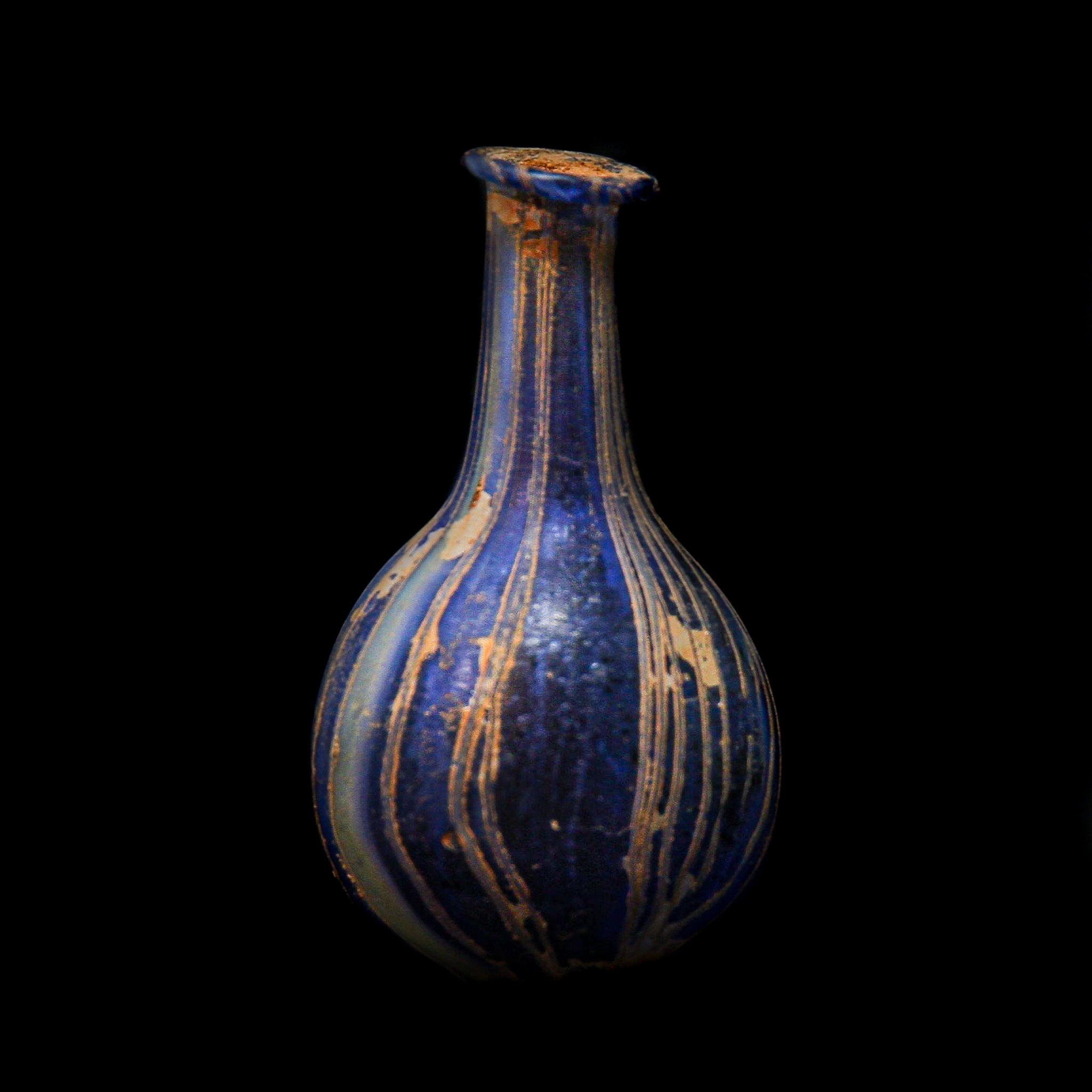 A Roman Blue Marbled Glass Vessel | 2nd-3rd century AD