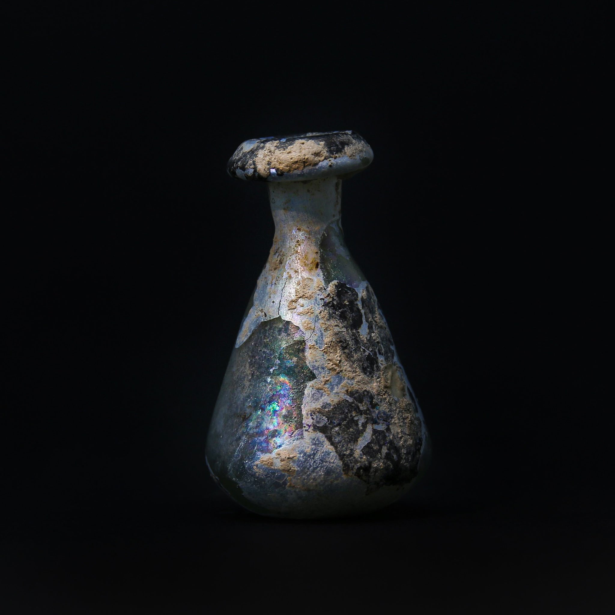 A Roman Iridescent Glass Bottle | 3rd-4th century AD