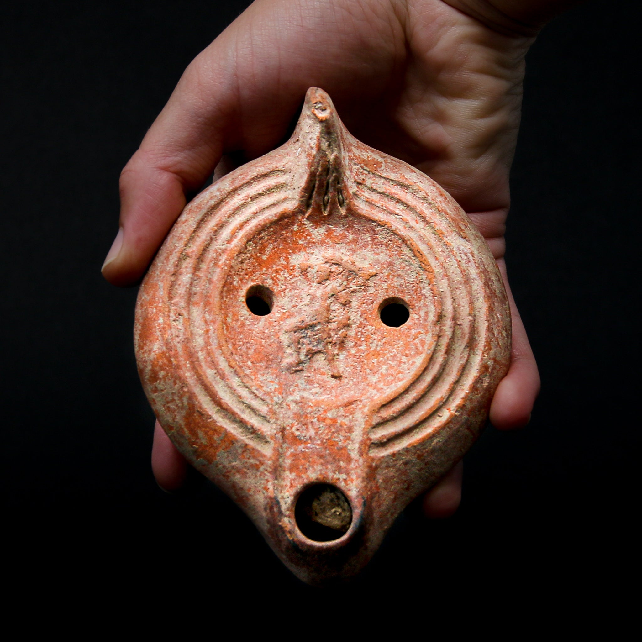 A Roman Terracotta Oil Lamp with Dancer | Circa 1st-3rd Century AD
